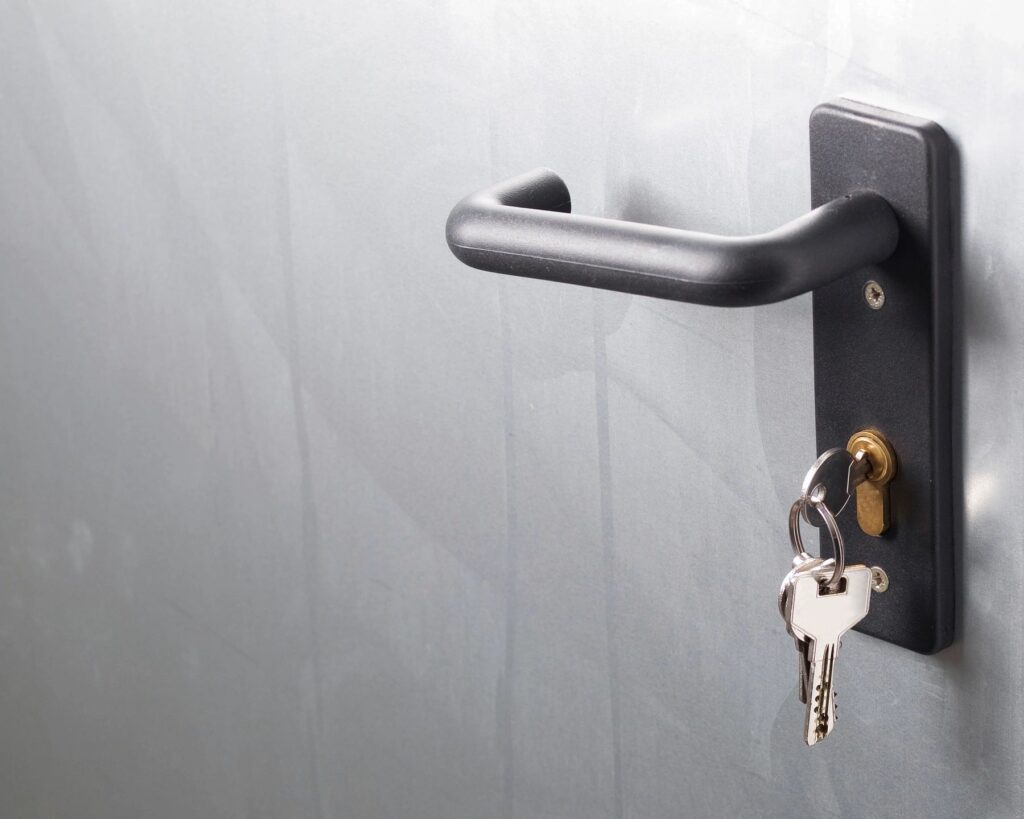 Door handle with keys hanging form the lock